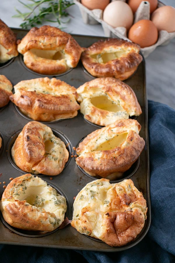 Herbed Yorkshire Pudding in muffin tins with eggs. 