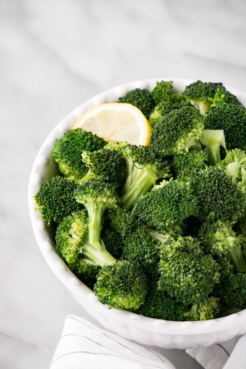 How to steam Broccoli with cooked broccoli in a white bowl