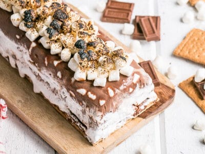 S'mores Icebox Cake with toasted mini marshmallows on top.