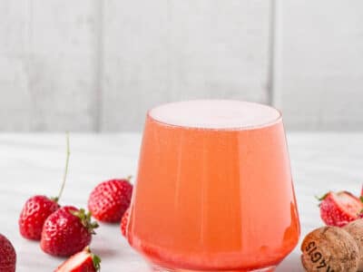 Strawberry Rosé Aperol Spritz is a fizzy refreshing cocktail made from only 4 ingredients! It's the perfect way to start off an evening or to enjoy happy hour with!